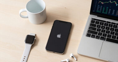 Apple earnings live updates: iPhone, AI and Tim Cook’s final CEO call